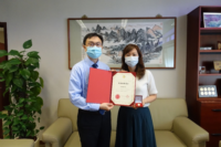 College Head Prof. Chan Sun On presenting the Long Service Award to Ms. Angela Chan.